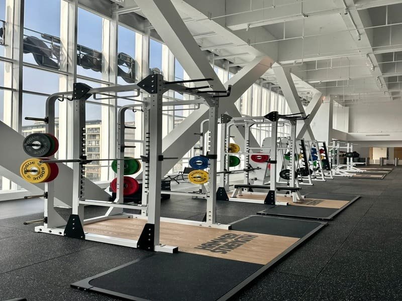 Durable rubber gym tiles in a weightlifting area